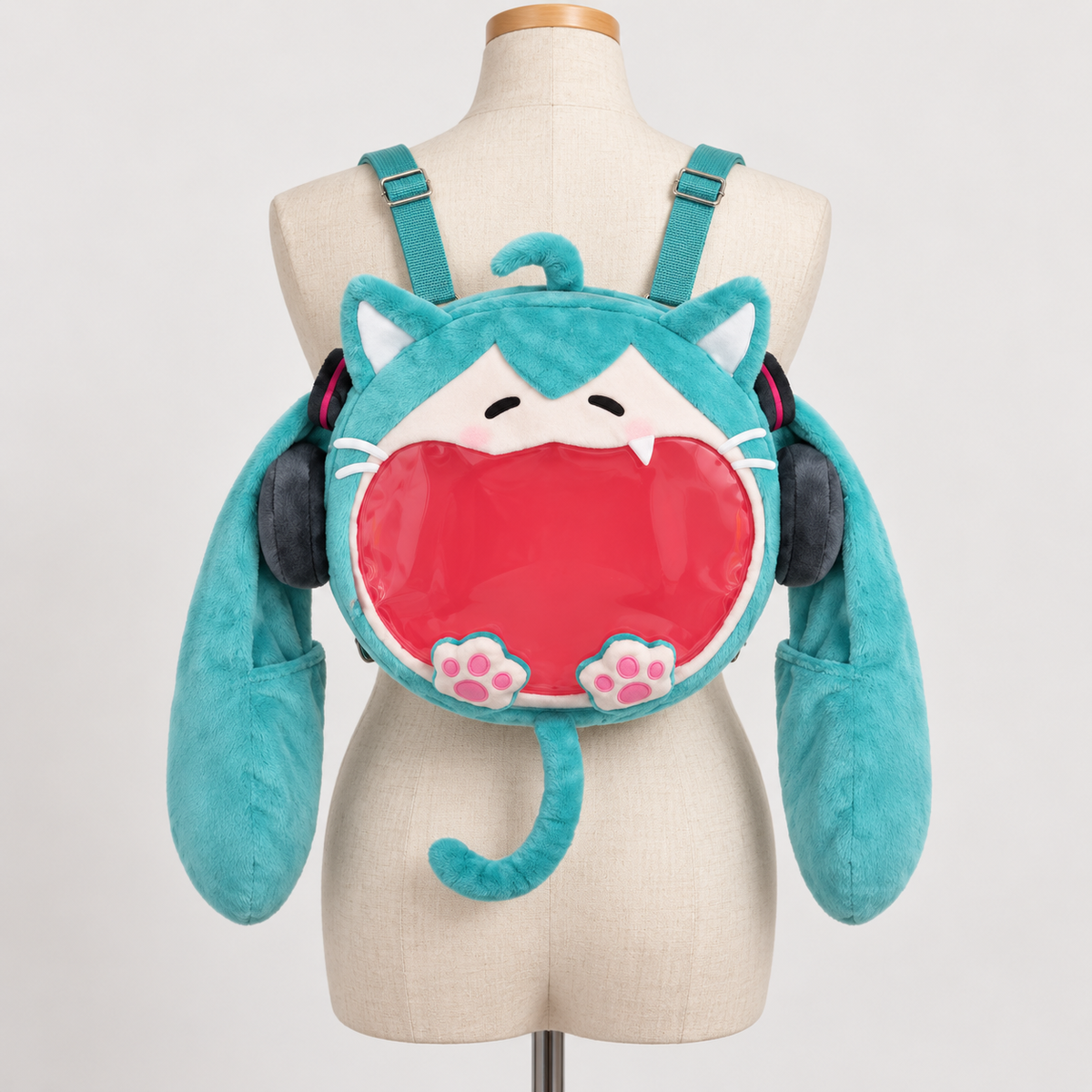 NyaNya plush ita backpack displayed on a dress form for approximate scale
