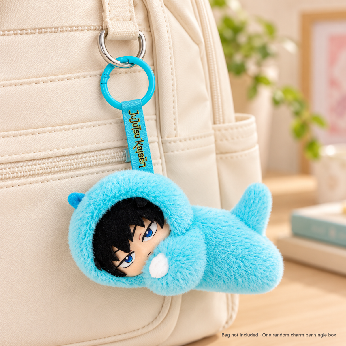 Representative Megumi Fushiguro charm attached to a bag; bag not included, character is random